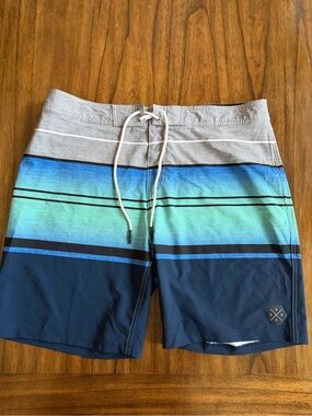 No Boundaries Men's Blue and Gray Gradient Stripe Swim Trunks. J036
